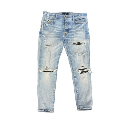 AMIRI MX1 Distressed Skinny Jeans