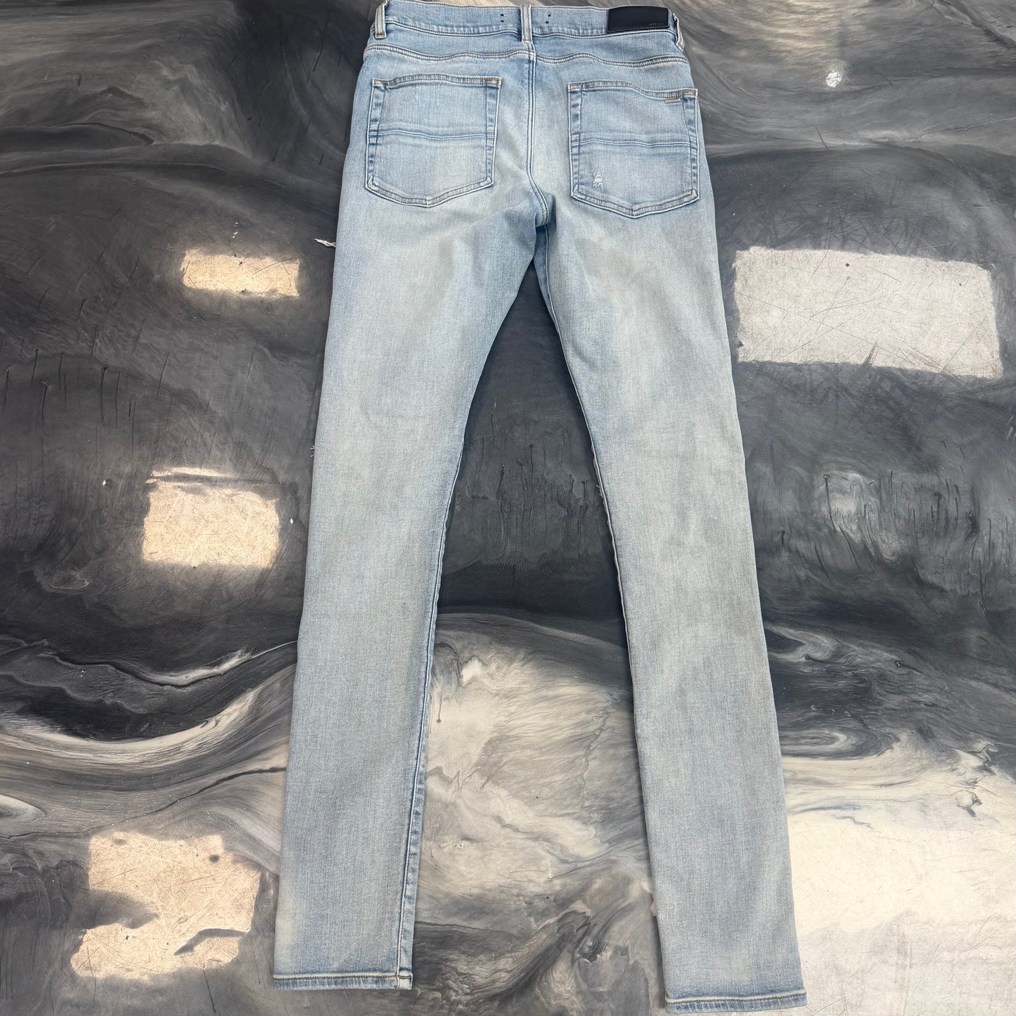 Amiri MX1 Light Wash Red Rip