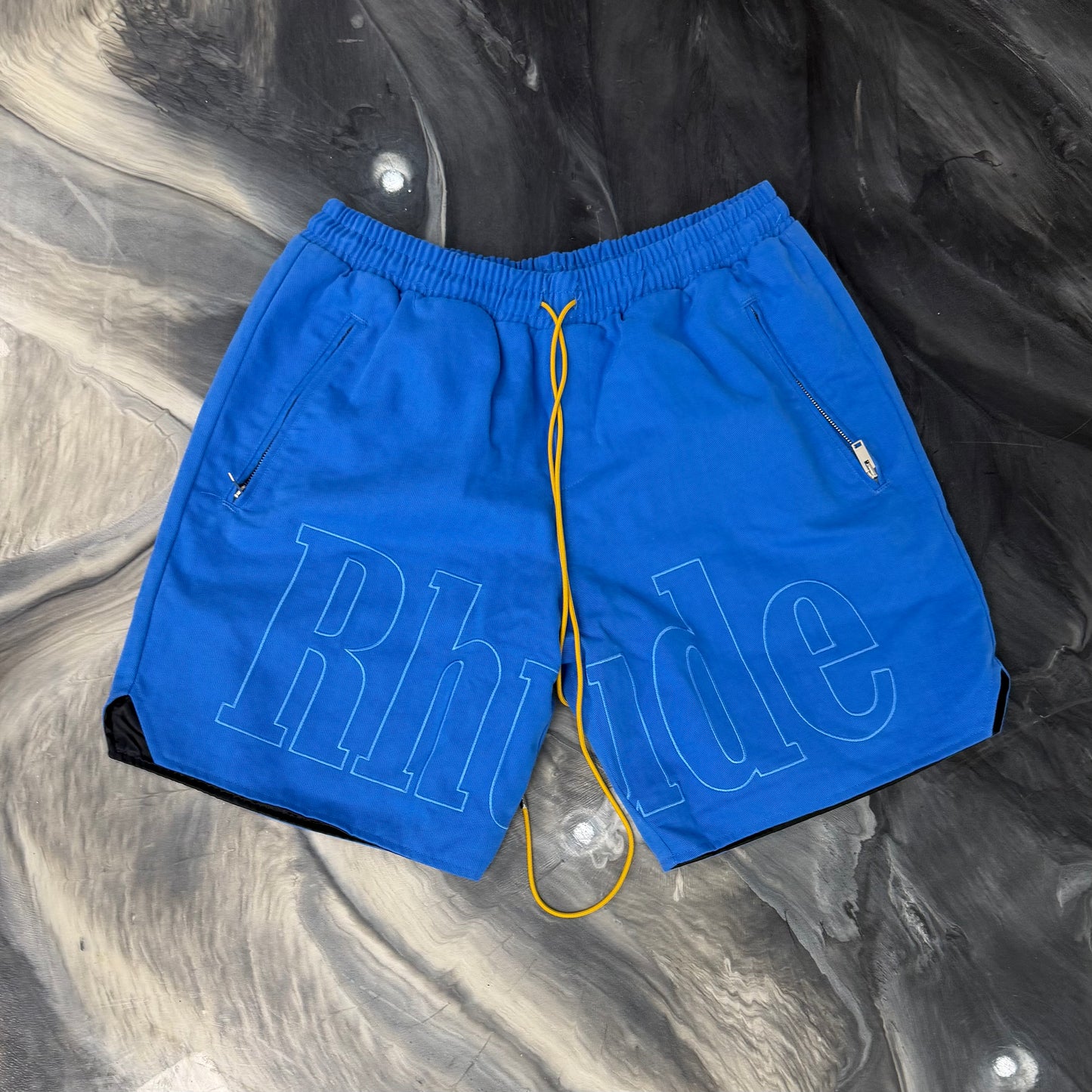 RHUDE Blue Spellout shorts