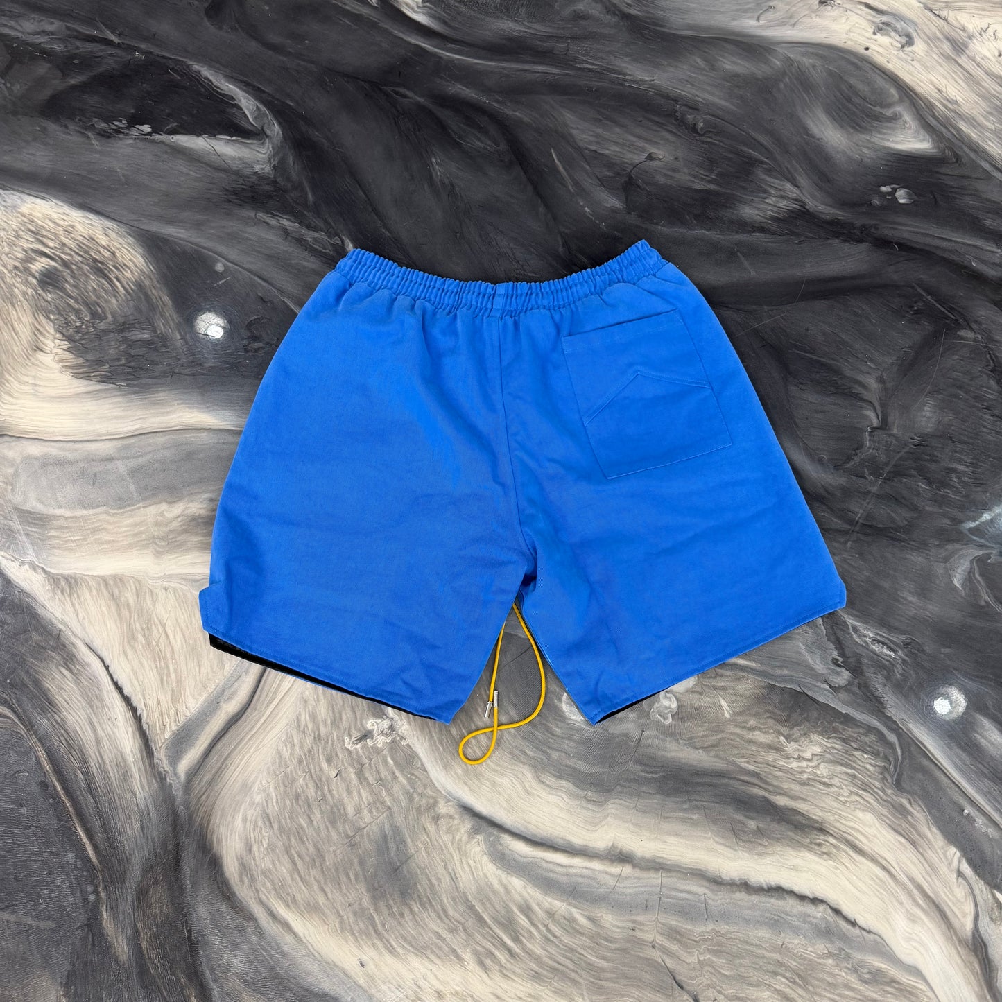RHUDE Blue Spellout shorts