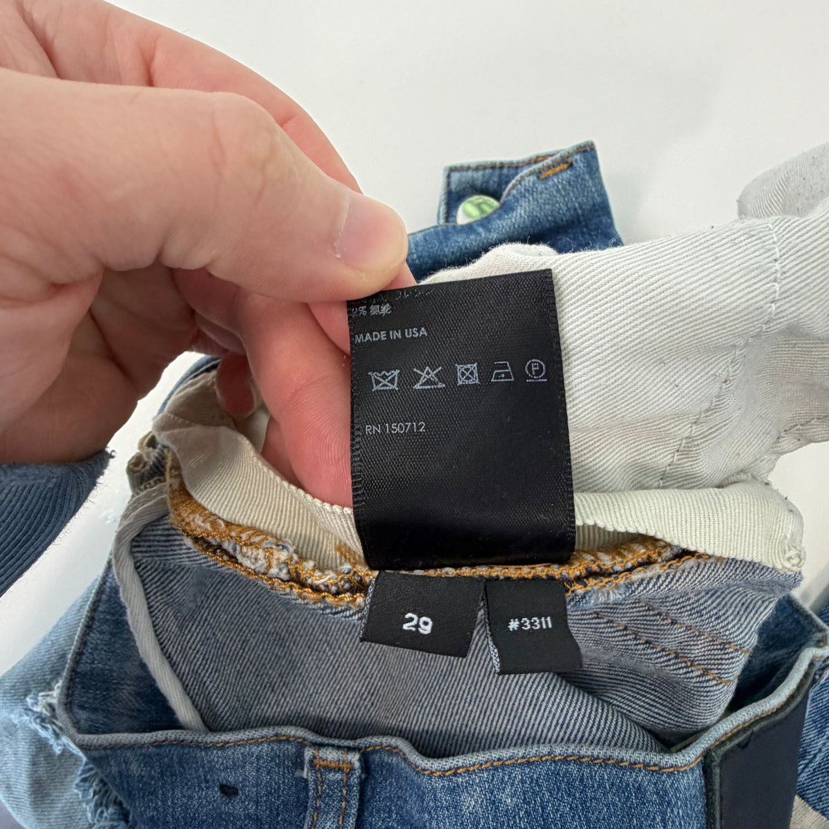 Amiri Distressed Repaired Denim Jeans with Logo