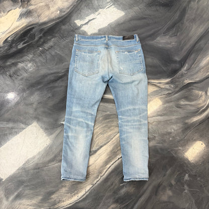 AMIRI MX1 Distressed Skinny Jeans